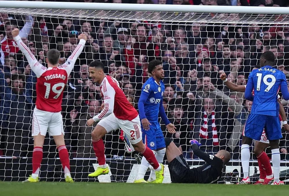 Arsenal players celebrating after scoring against Chelsea Arsenal players celebrating after scoring against Chelsea