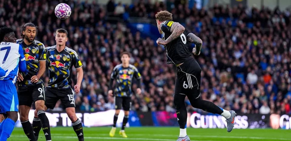 Leeds goalkeeper attempting to catch the ball Leeds goalkeeper attempting to catch the ball