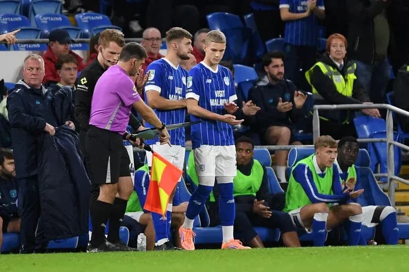 Substitution taking place during a football match Substitution taking place during a football match