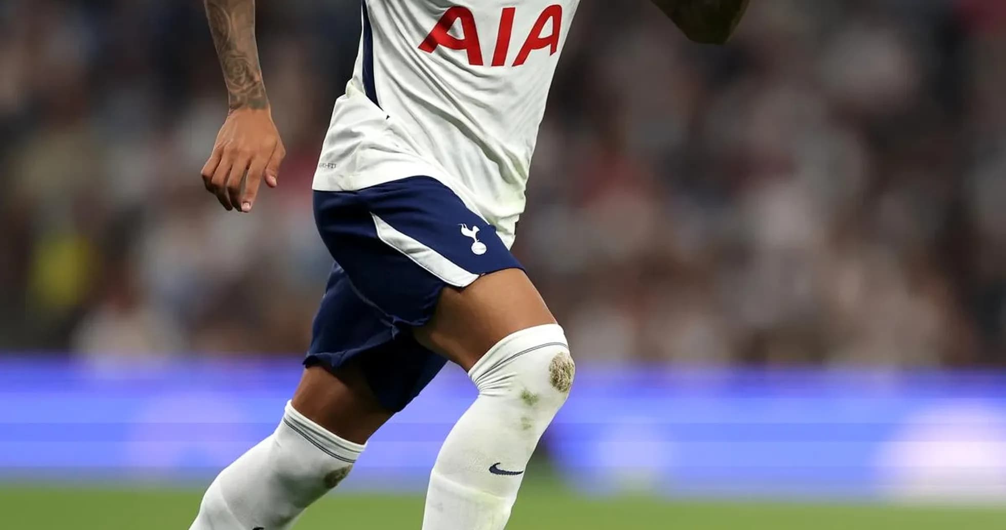 Player dribbling ball during match for Tottenham Player dribbling ball during match for Tottenham