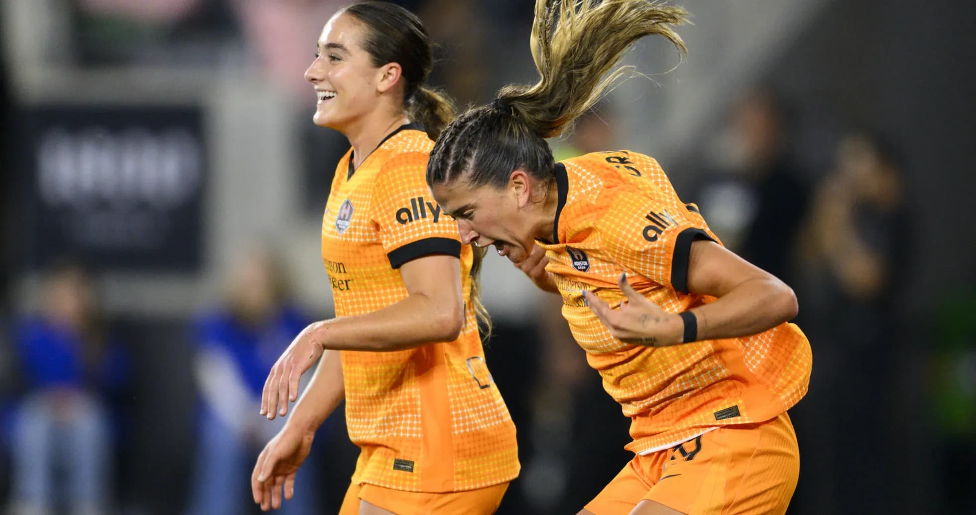 Players celebrating a goal during match Players celebrating a goal during match