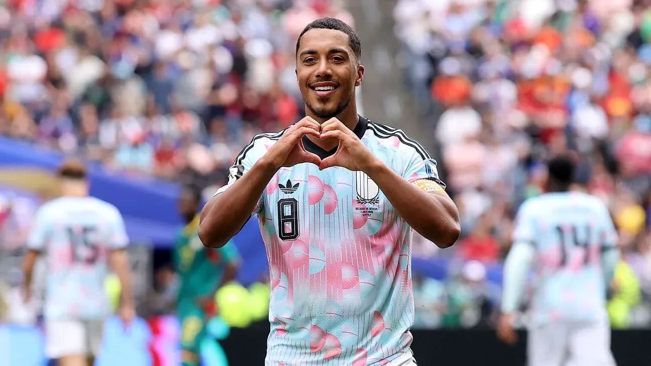 Player making heart gesture after scoring goal Player making heart gesture after scoring goal