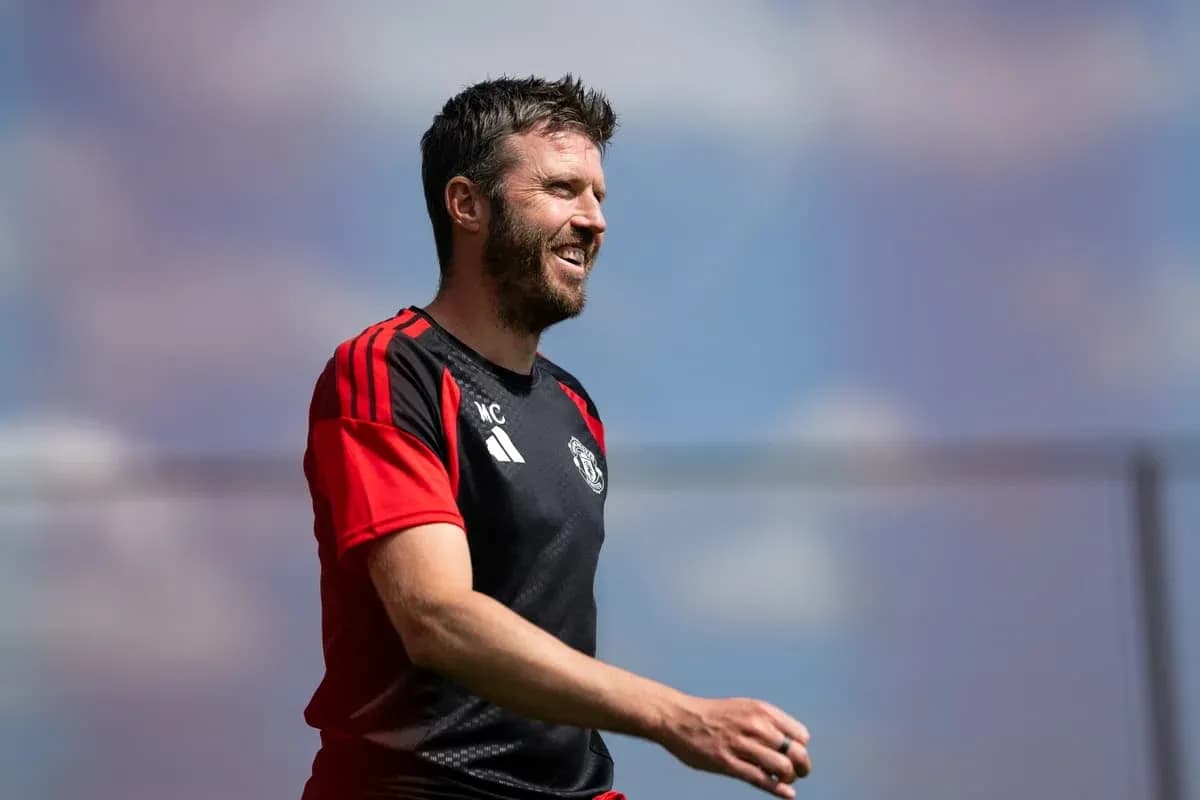 Coach smiling during training session at Manchester United Coach smiling during training session at Manchester United