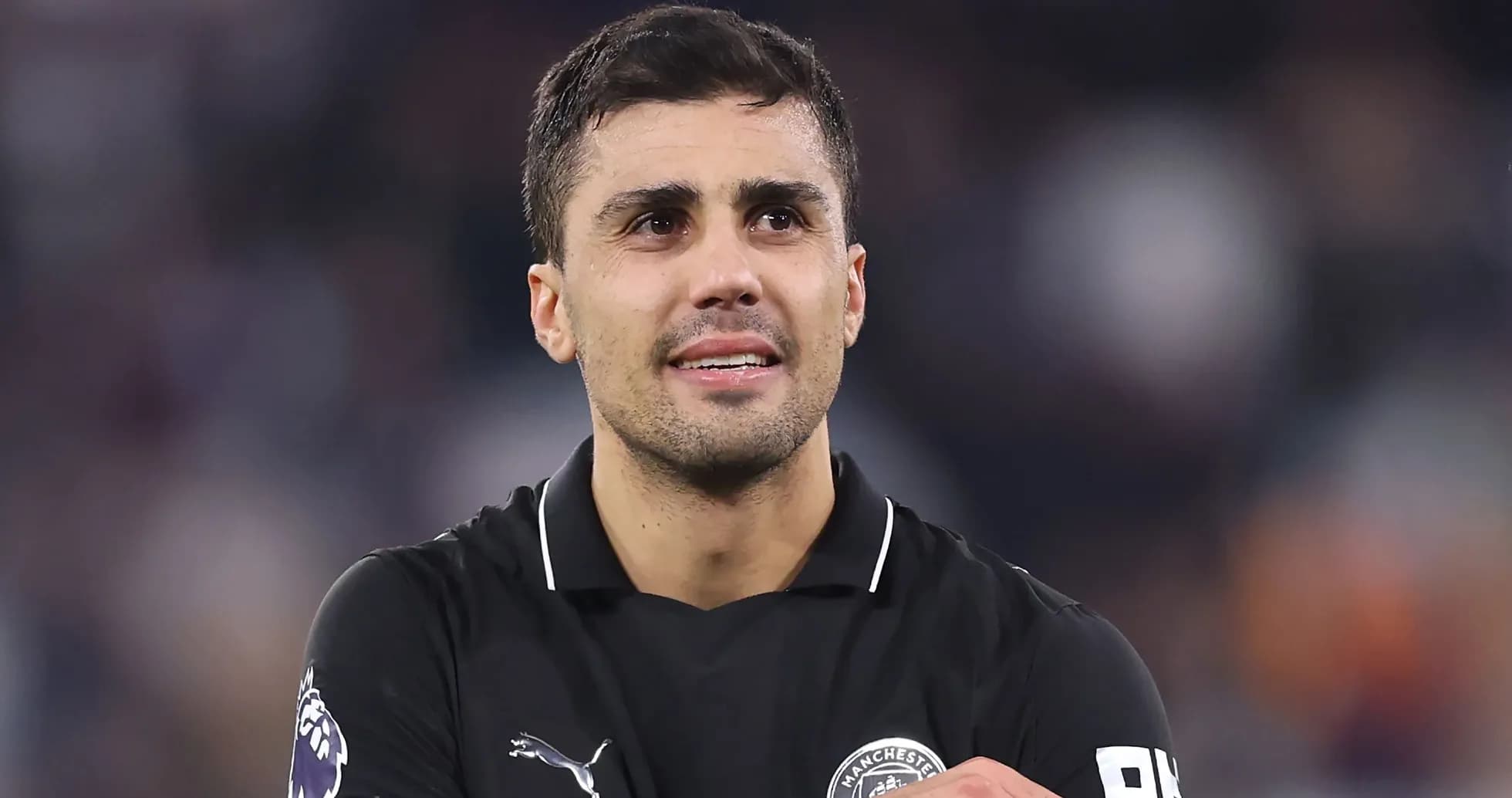 Player wearing black jersey during match celebration Player wearing black jersey during match celebration