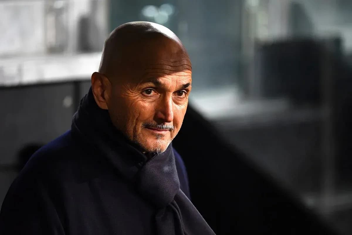 Coach wearing a dark scarf in stadium Coach wearing a dark scarf in stadium