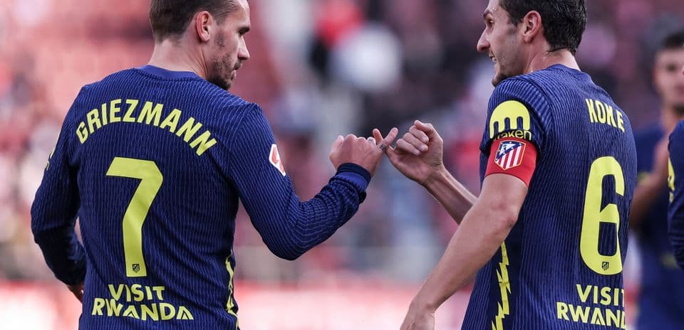 Griezmann and Koke celebrating during match Griezmann and Koke celebrating during match