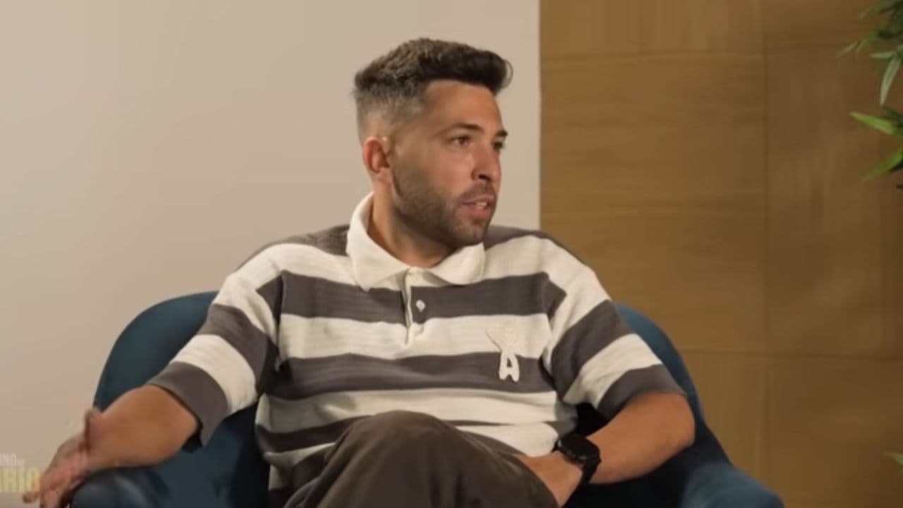 Person speaking during an interview in a chair Person speaking during an interview in a chair