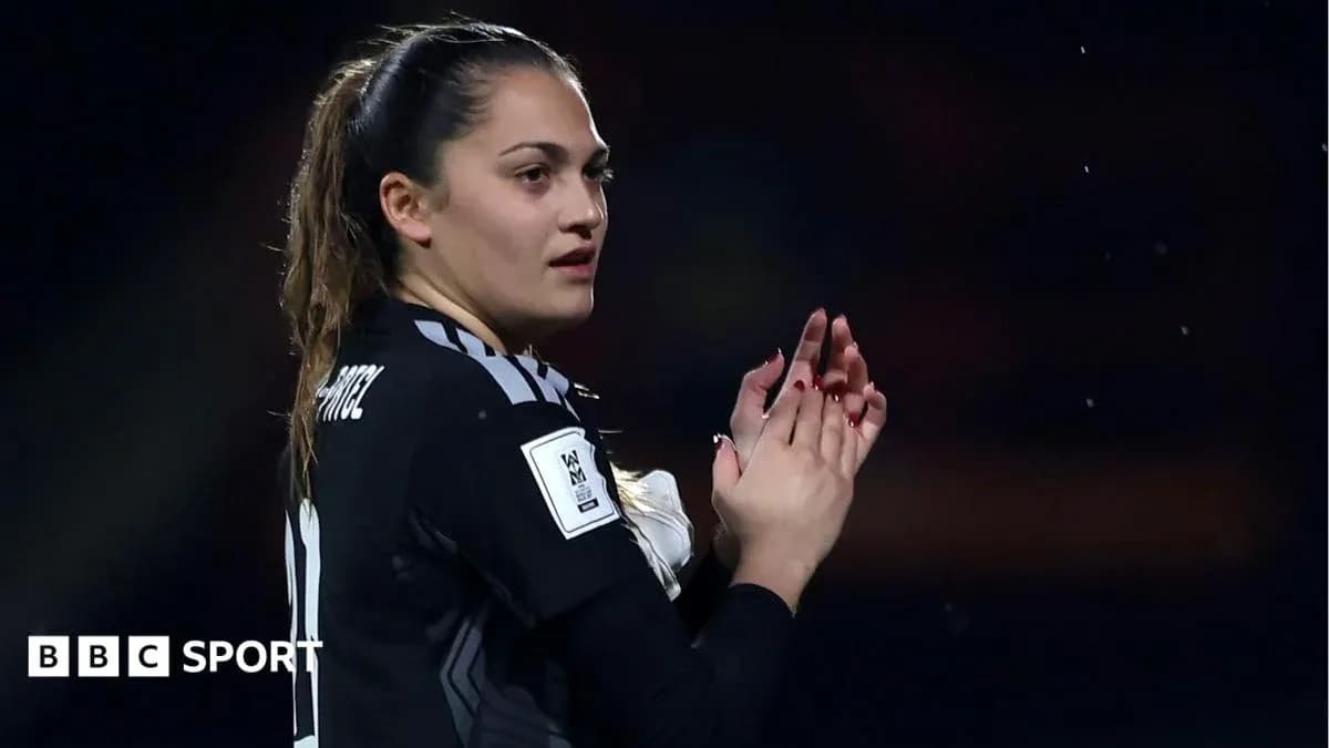 Goalkeeper applauding during a football match Goalkeeper applauding during a football match