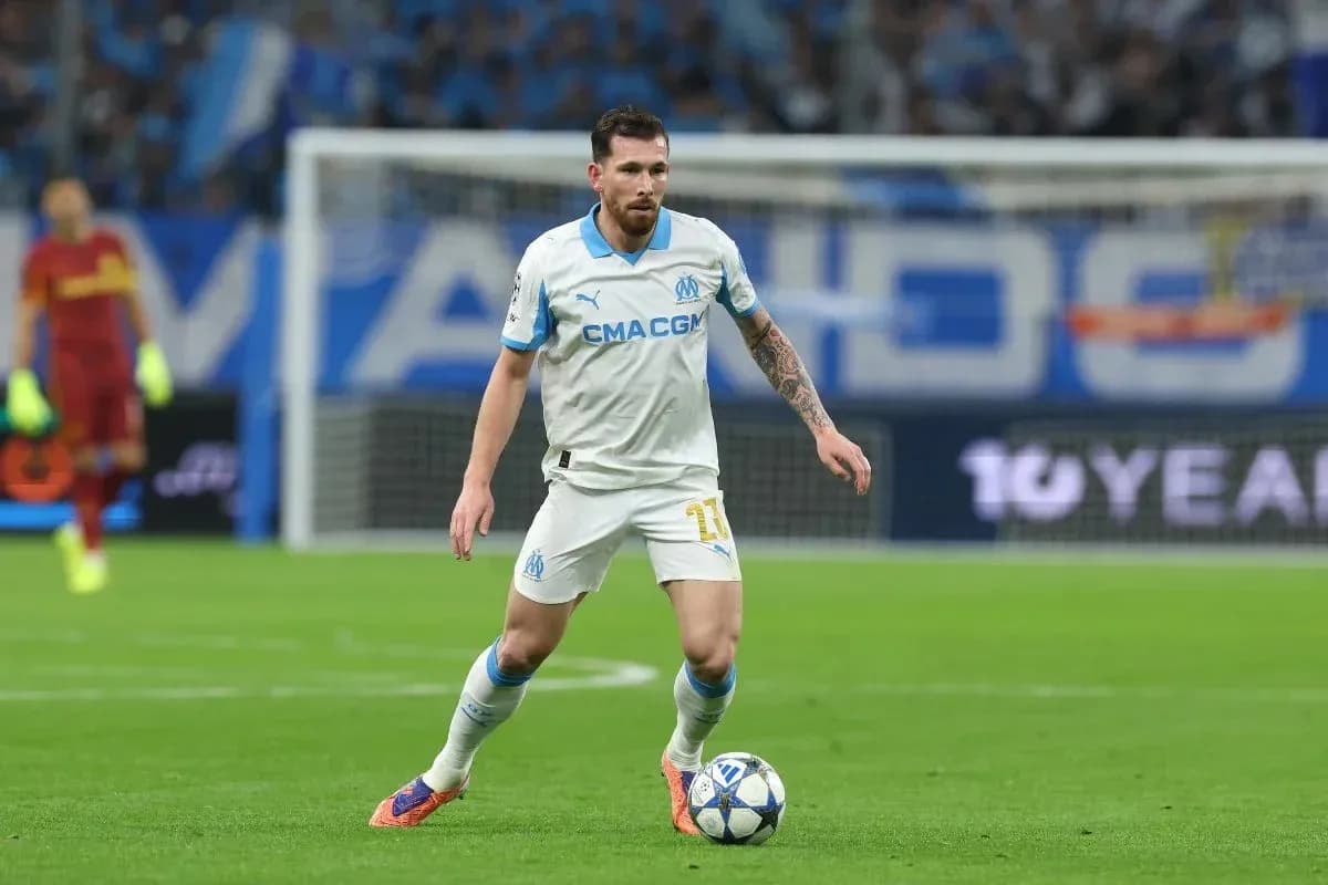 Player dribbling the ball during a match Player dribbling the ball during a match