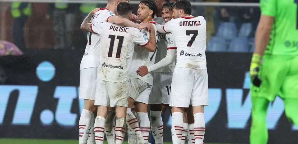 AC Milan players celebrating a goal in match AC Milan players celebrating a goal in match