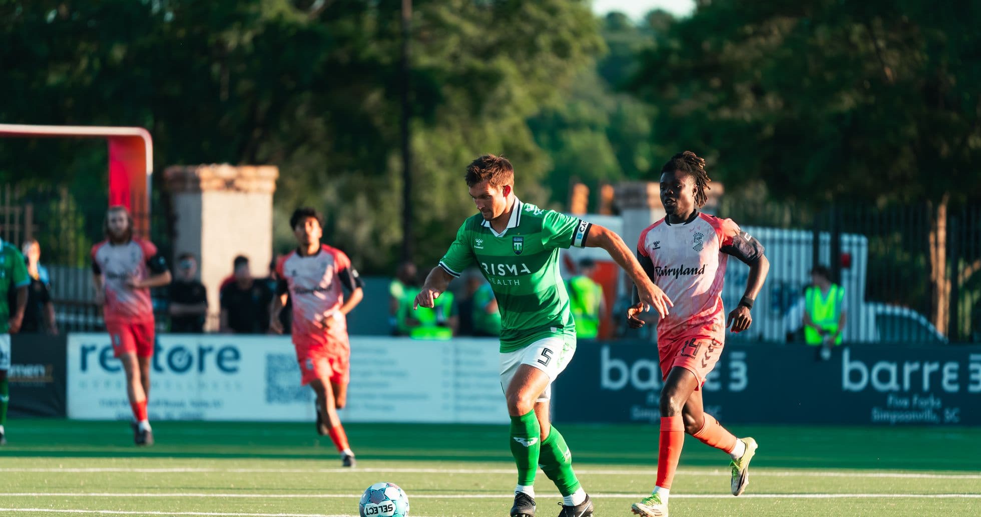 Player dribbling the ball during match Player dribbling the ball during match