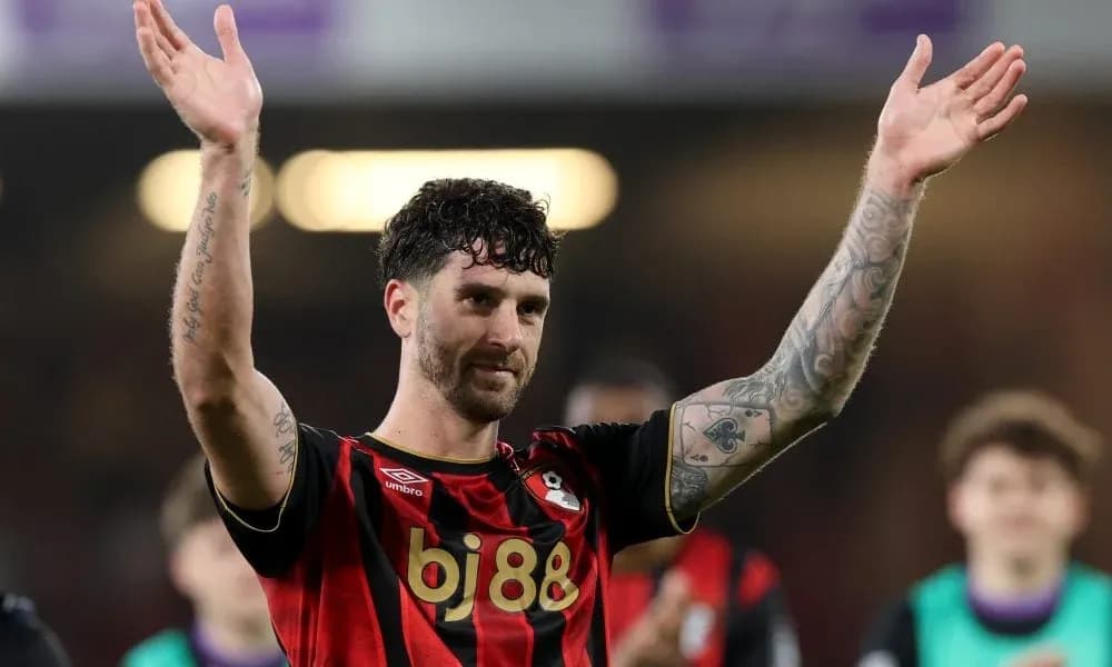 Player celebrating with fans after match Player celebrating with fans after match