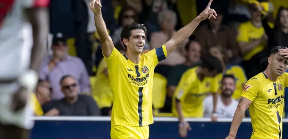 Villarreal player celebrating goal during match Villarreal player celebrating goal during match
