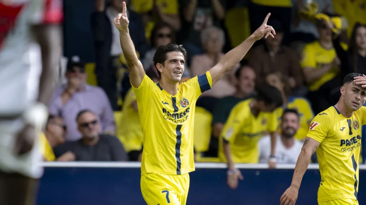 Villarreal player celebrating goal during match Villarreal player celebrating goal during match
