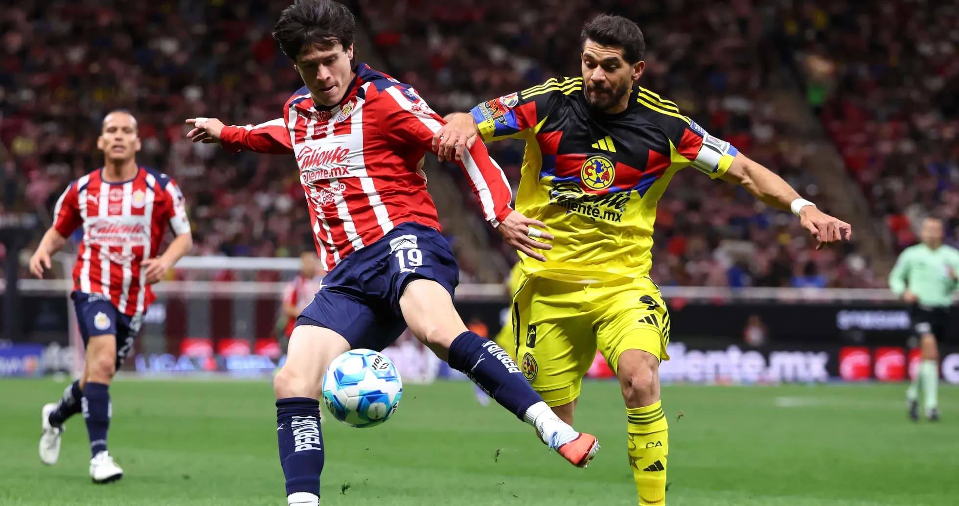 Club America player challenging Guadalajara Chivas Club America player challenging Guadalajara Chivas