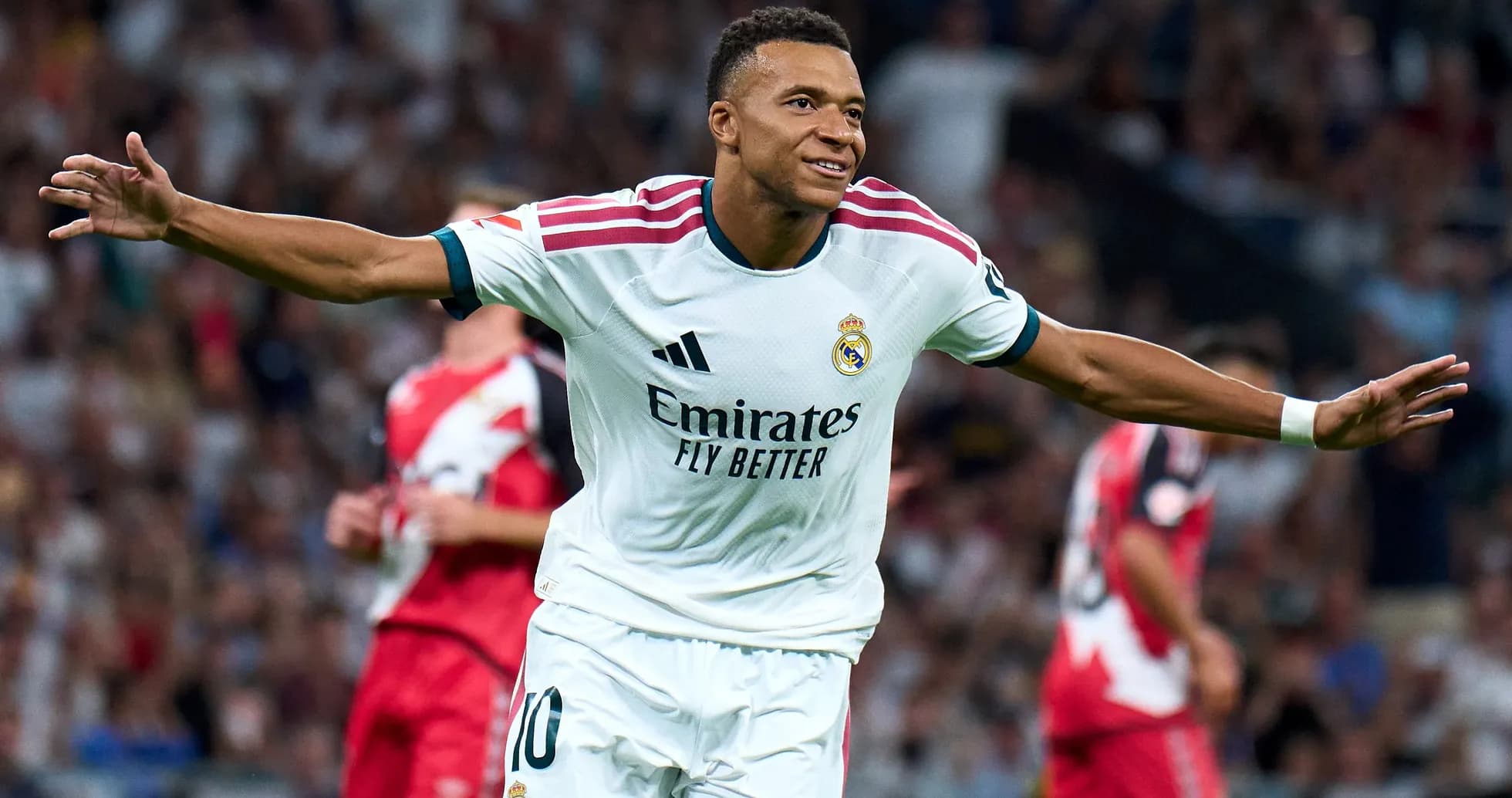 Player celebrating goal in Real Madrid jersey Player celebrating goal in Real Madrid jersey