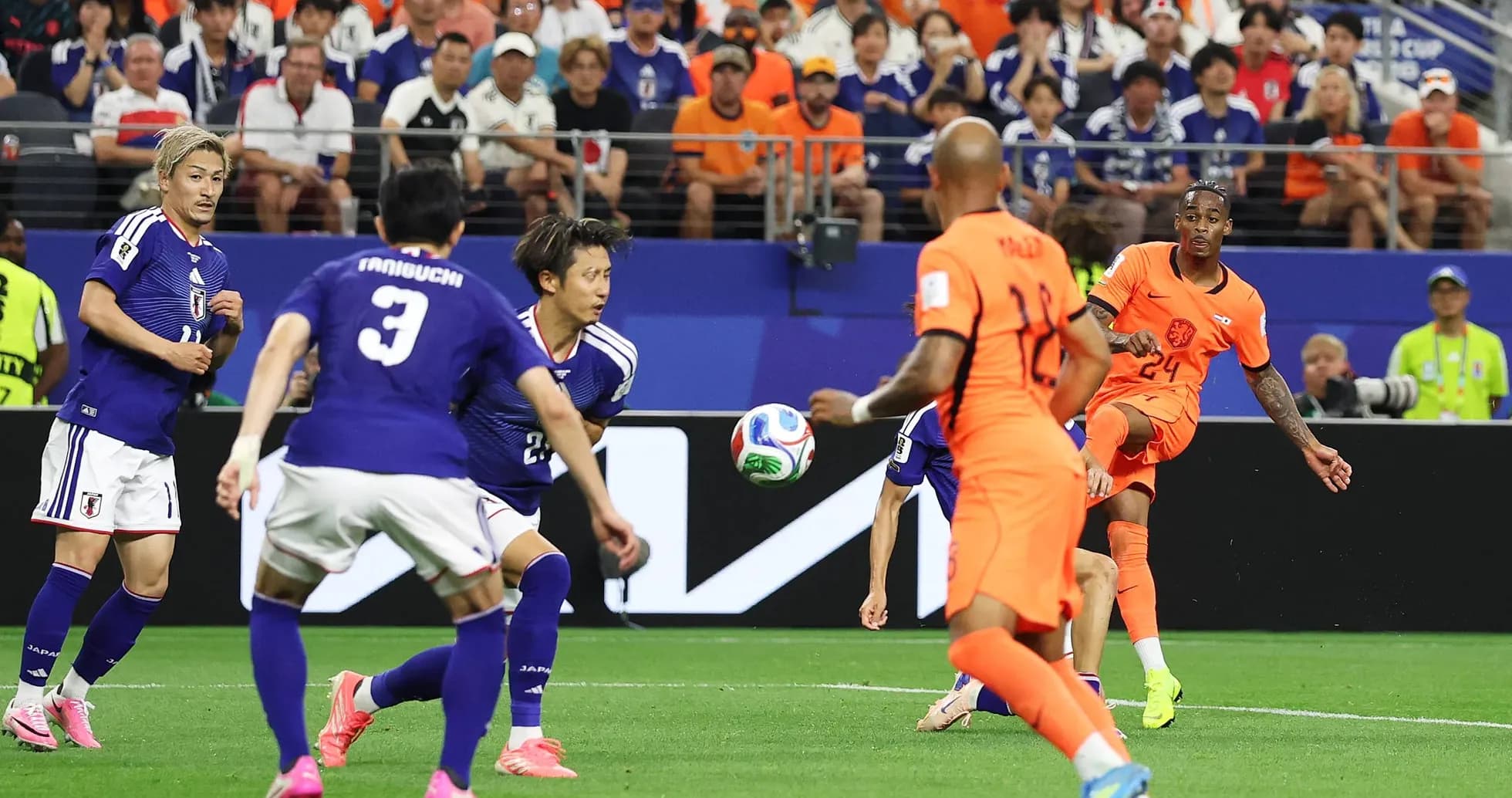 Players from Netherlands and Japan in World Cup match Players from Netherlands and Japan in World Cup match
