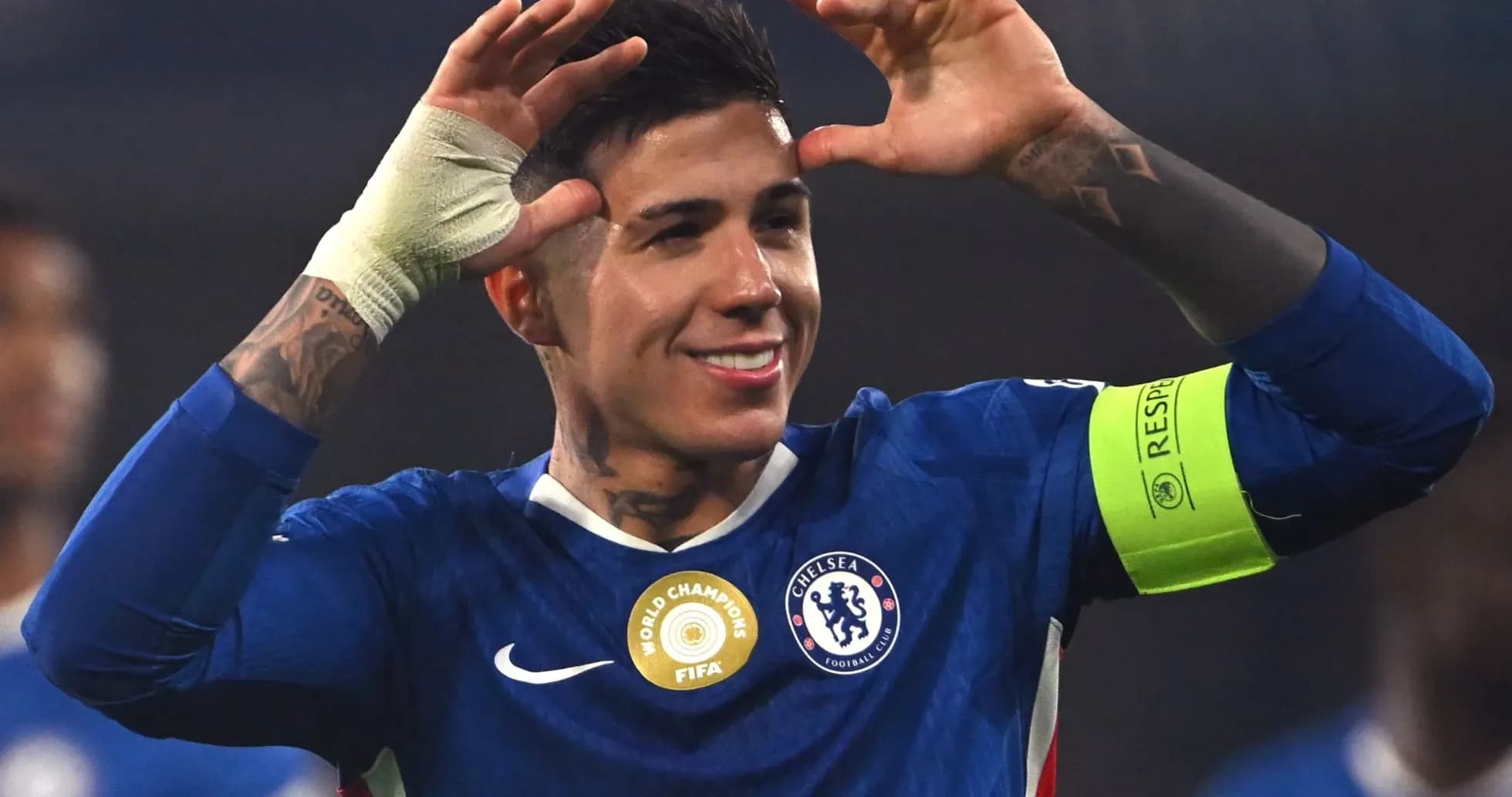 Chelsea player celebrating with arms raised Chelsea player celebrating with arms raised