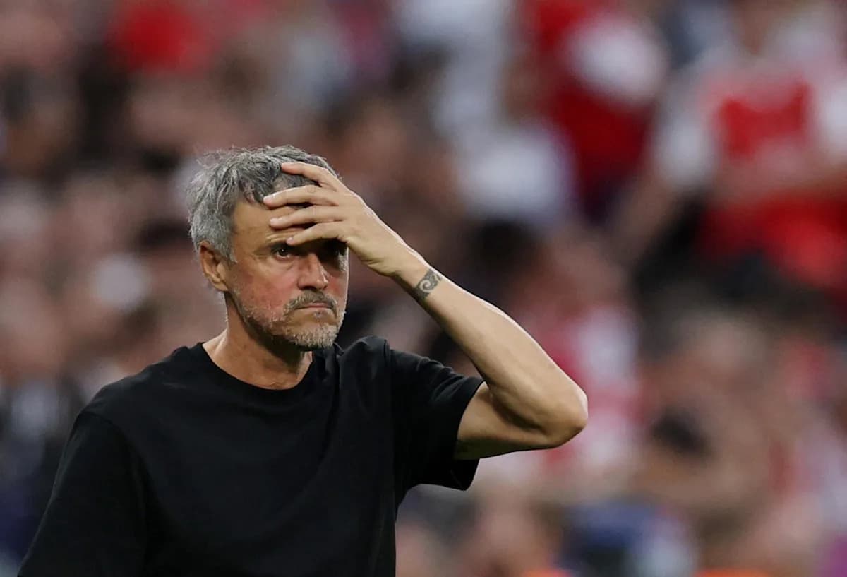 Manager with hand on forehead during match Manager with hand on forehead during match