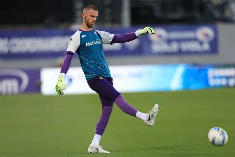 Goalkeeper practicing kick on training field Goalkeeper practicing kick on training field