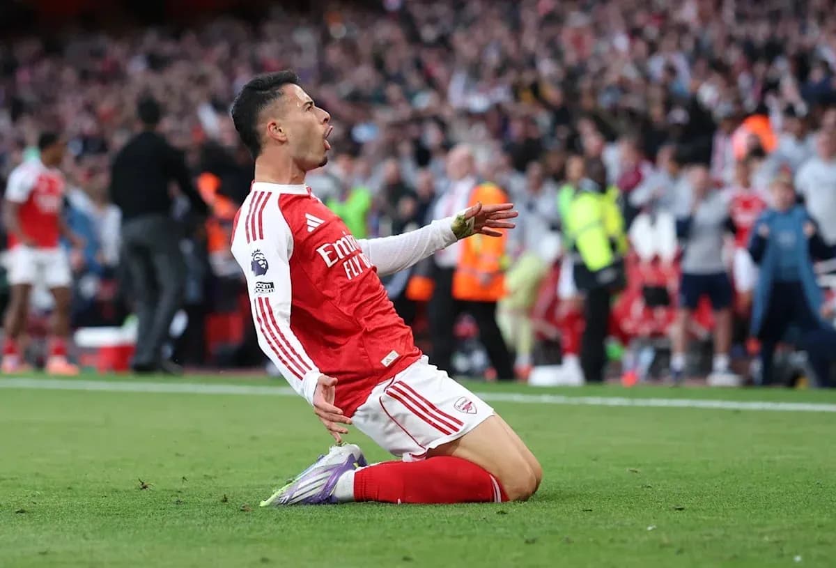 Player celebrating after scoring a goal on field Player celebrating after scoring a goal on field