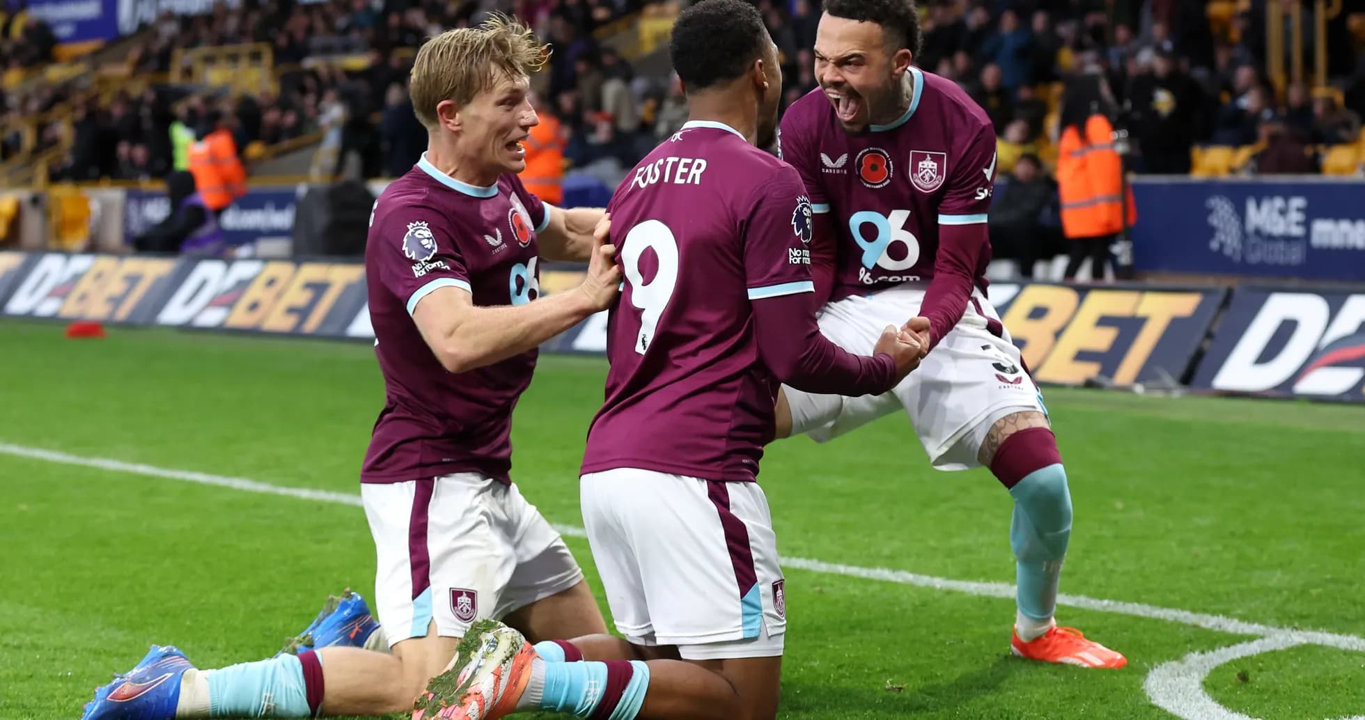 Burnley players celebrating a goal during match Burnley players celebrating a goal during match