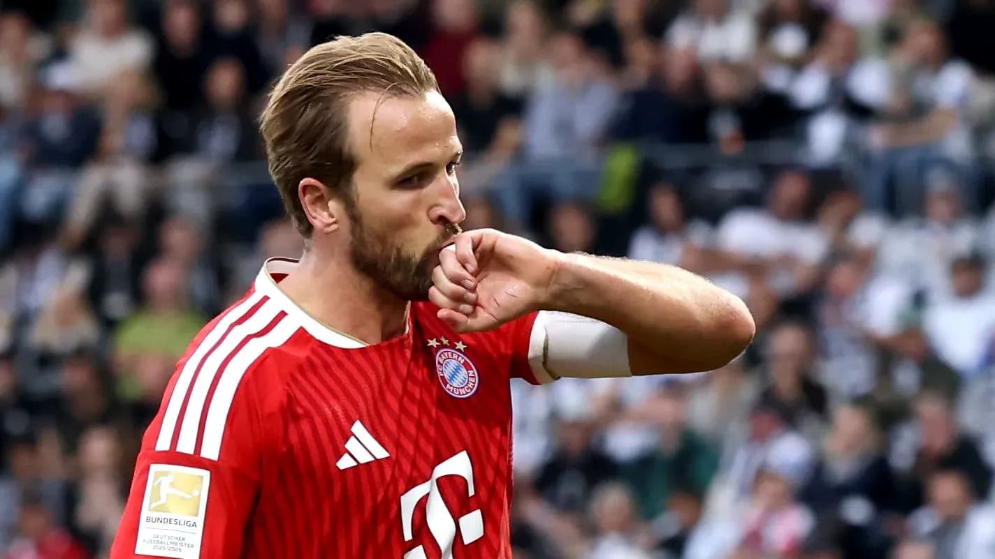 Player kissing Bayern Munich jersey during match Player kissing Bayern Munich jersey during match