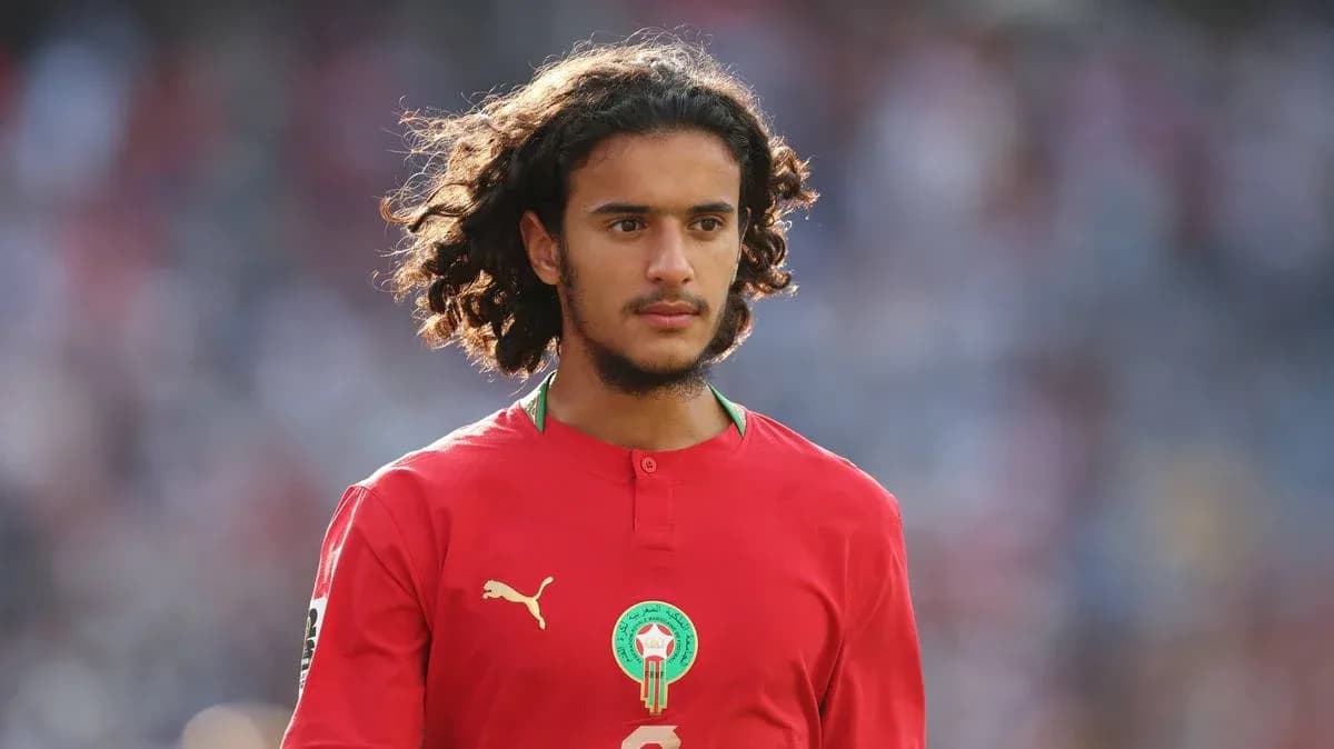 Player in red jersey during match warm-up Player in red jersey during match warm-up
