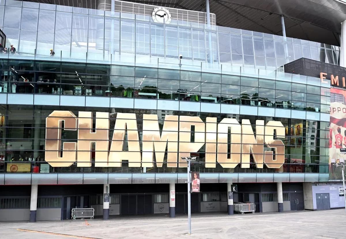 Champions sign displayed on stadium facade Champions sign displayed on stadium facade