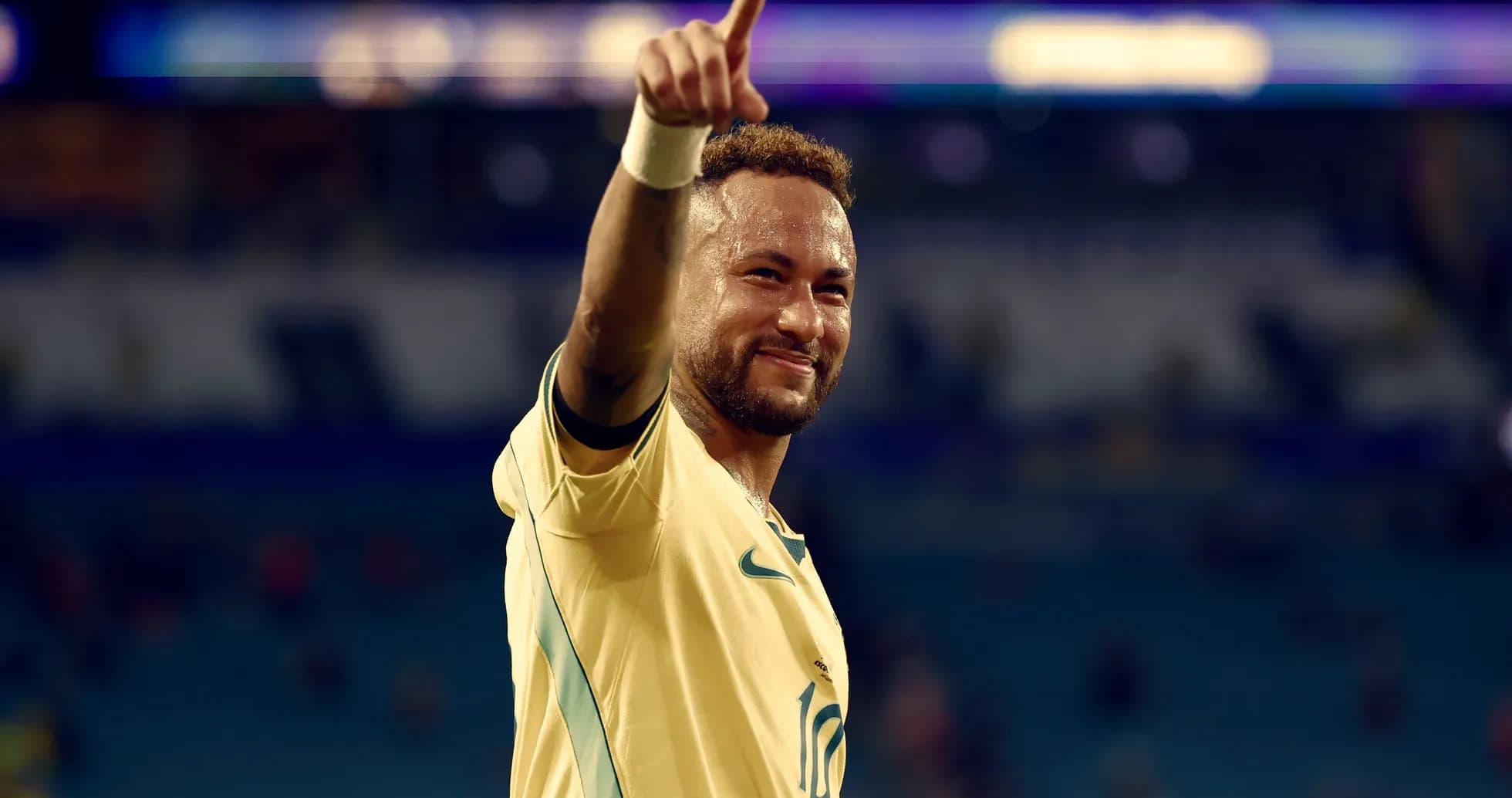 Neymar celebrating after a match, wearing Brazil jersey Neymar celebrating after a match, wearing Brazil jersey