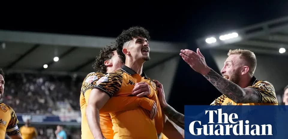 Players celebrating a goal during a football match Players celebrating a goal during a football match