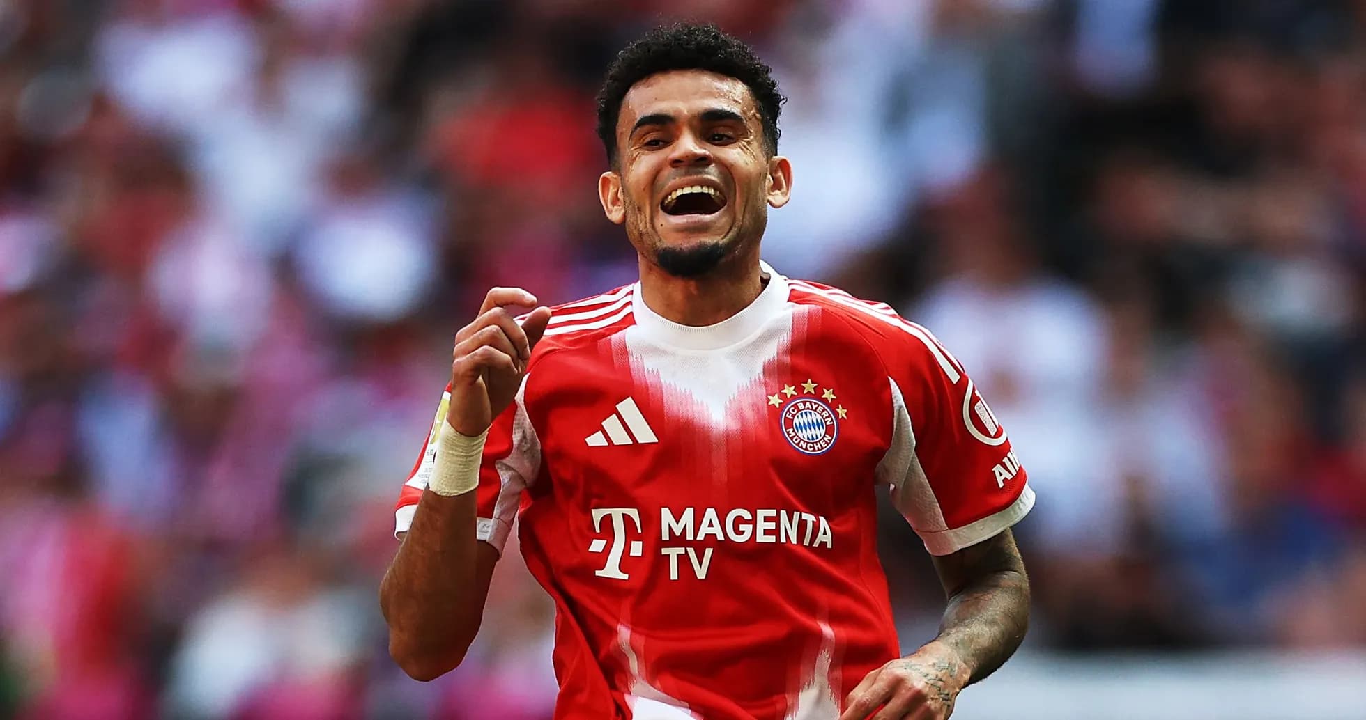 Player celebrating a goal in Bayern Munich jersey Player celebrating a goal in Bayern Munich jersey